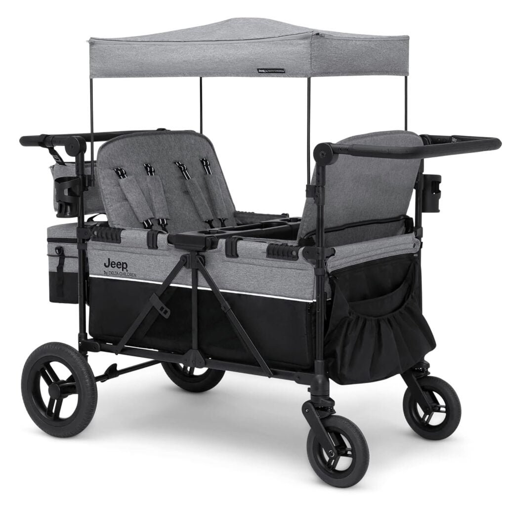 Jeep Wrangler Deluxe 4 Seater Stroller Wagon by Delta Children - Premium Quad Stroller Wagon for 4 Kids with Convertible Seats, Adjustable Push/Pull Handles, Removable Canopy  Flat Fold, Grey
